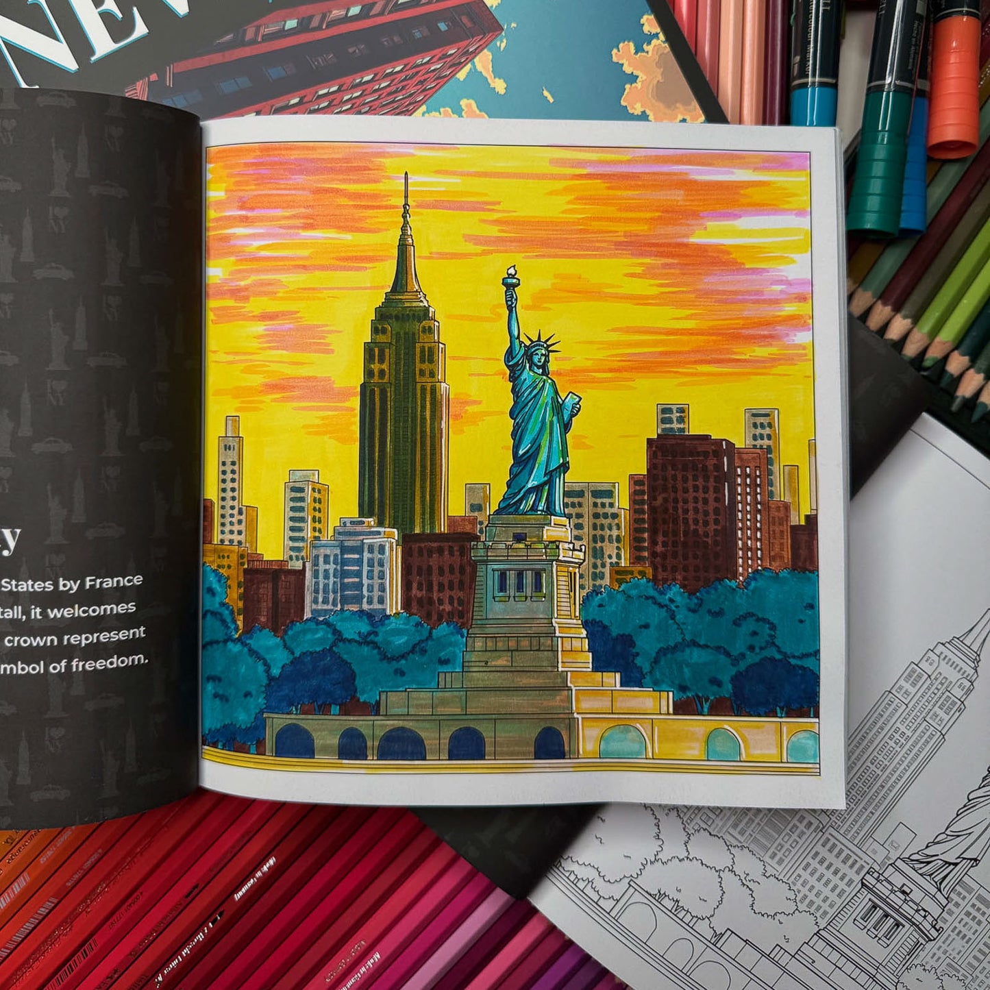 Statue of Liberty with Empire State Building coloring page in progress — line art coloring page from New York Travel Coloring Book for Adults | MATI Publishing